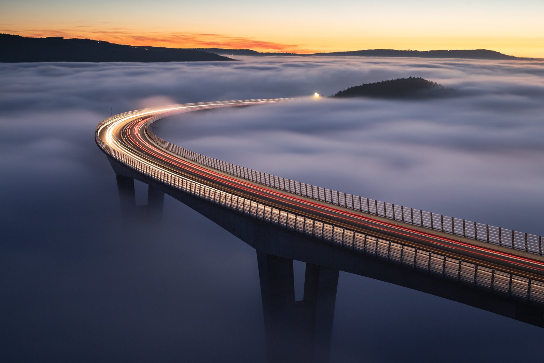 Črni Kal Viaduct rising above the fog